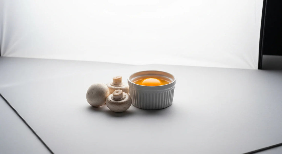 Tea cup with a light-colored interior on a white surface