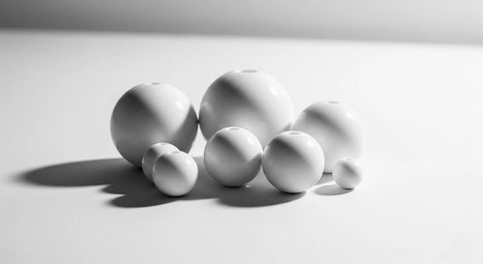 White clay spheres on a light gray background