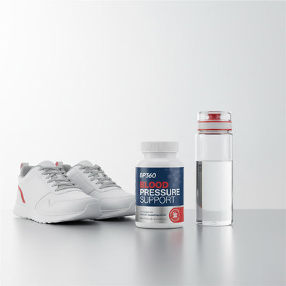 White sneakers, BP360 Blood Pressure Support supplement bottle, and clear water bottle on a light gray background
